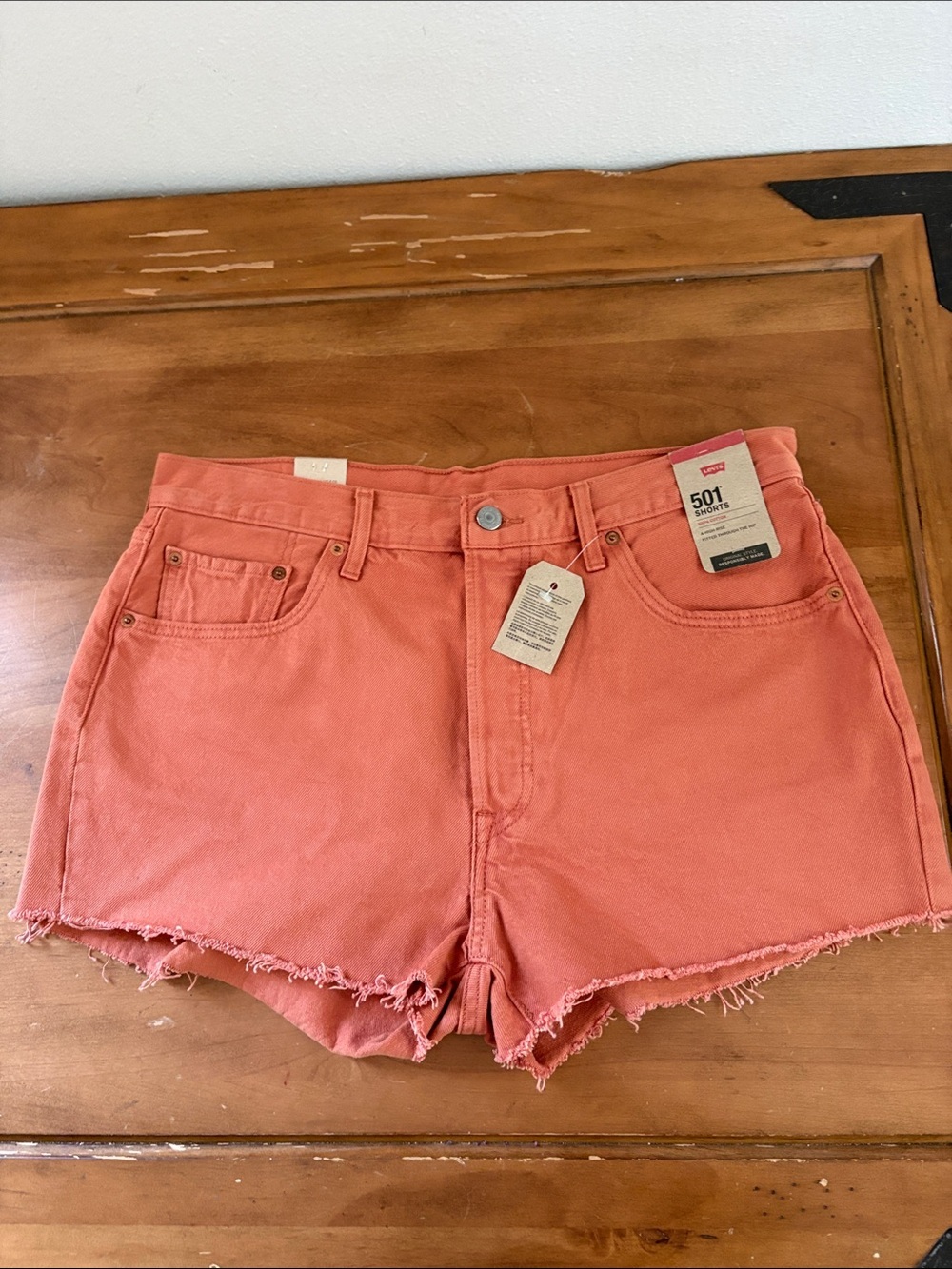 Levi's NWT 501 Cutoff Denim Shorts in Coral Orange Size 34